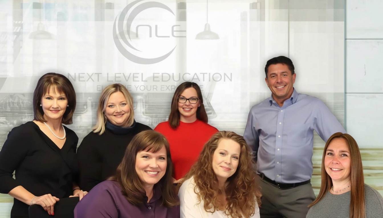 Seven key members of the Next Level Education team smile and pose for the camera